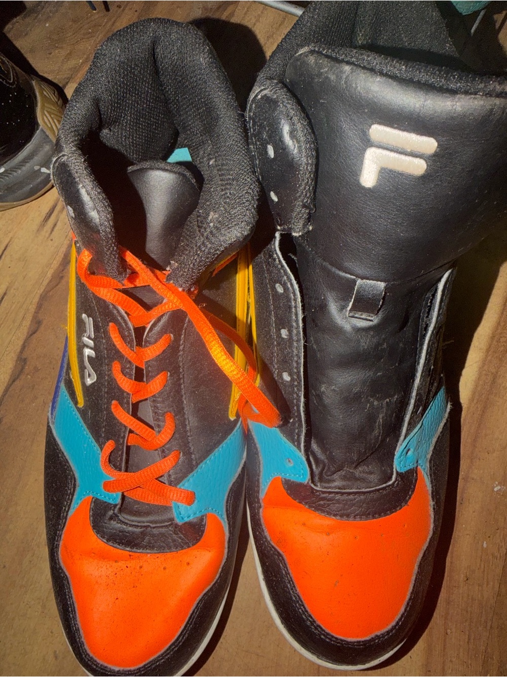 Fila Men's Black Orange Blue High-Top Sneakers with Yellow Accents
